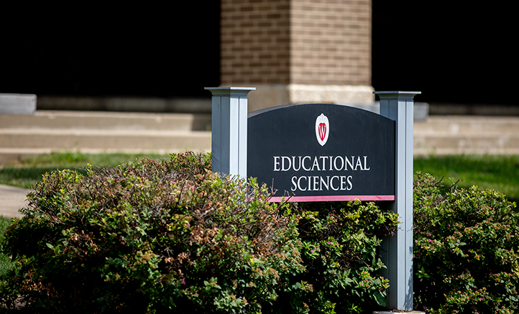 Educational Sciences building sign with the UW crest
